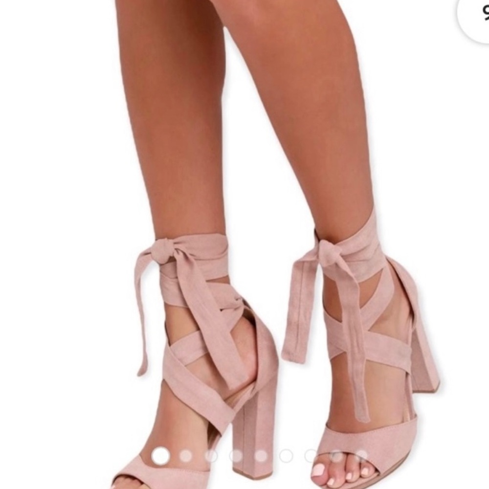 Pink lace up heels.